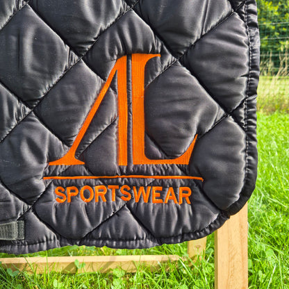 Occasion : Tapis Alexandra Ledermann noir orange